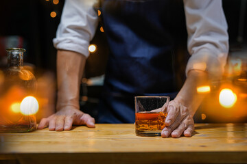 Bartender Serve Whiskey, on wood bar, 