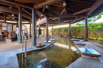 Beppu, Japan - Nov 25 2022: Ashiyu Foot Bath is just a few steps down the street from the steam cooking center Jigoku Mushi Kobo in Kanawa district in Beppu, Oita. The bath is free to use.