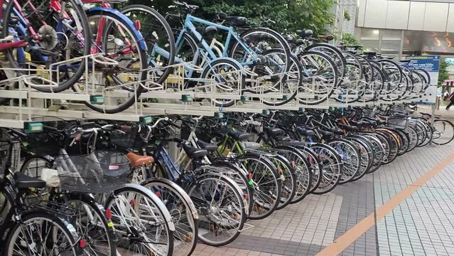 Bicycles standing in a row in the parking lot