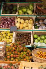 Tropical fruits for sale at the local market. Rambutan, Mango, Apple, Lychee, Mangosteen, Dragon Fruit and Pump 