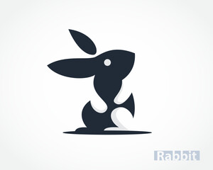 cartoon easter bunny rabbit looking up with hand and foot negative space logo design template illustration