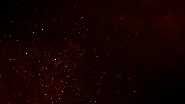 4K 3D Animation of Burning hot bonfire fire sparks dark background. Campfire Flames. Particles over black. Flying Embers fire. sparks particles of fire Air Strike. with smoke. Flying Embers from fire