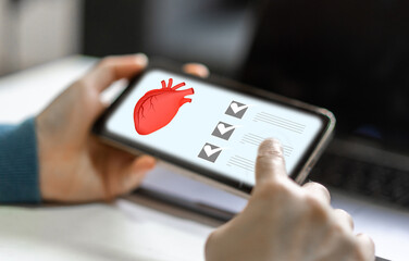 Human use phone medical health checkup red heart organs, health and medical, heart health, heart...