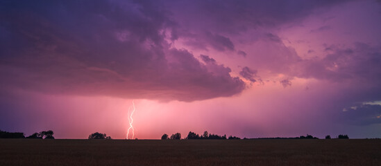 Storm, lightning strike in the horizon, thunder concept