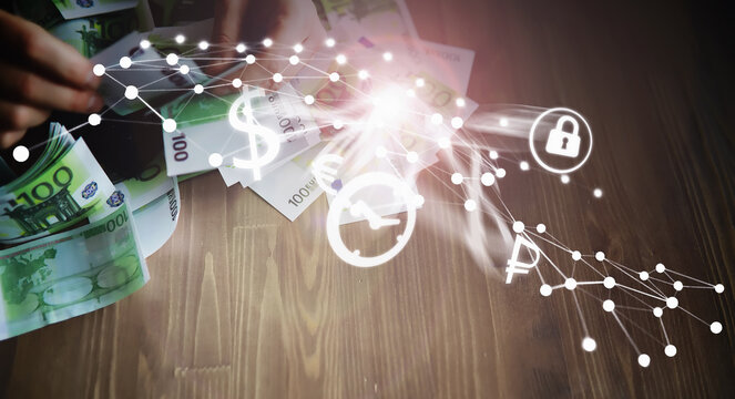 Abstract media background. European Union banknotes in hands. A pack of 100 euro banknotes in the hands. Cash transfer. - Powered by Adobe