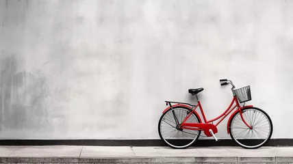 Fotobehang Retro red bicycle on the grunge and dirty grey wall with copy space. © Shanorsila