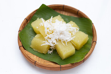 Steamed tapioca cake or cassava cake with grated coconut