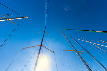 Fototapeta premium Sailboats background. Many sailing boats are at the pier. Nice trip around the islands, great weekend getaways and holidays.