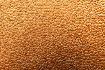 Golden textured surface as background, closeup view