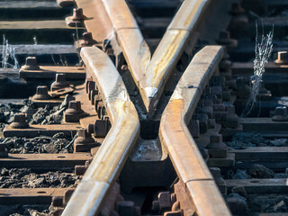 Acute angle railway crossing with frog rail