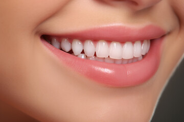 Dentistry, care and oral hygiene concept. Close-up caucasian woman healthy smile, side view of lips and clean white even teeth
