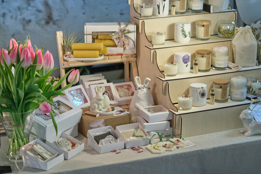 beautiful market stall filled with handcrafted items at a seasonal fair. Springtime events and celebrations, outdoor markets and festivals
