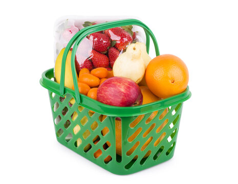 Assortment of exotic fruits and berries in baskets isolated on white