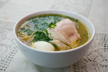 Caldo de Gallina. Chicken broth is a traditional dish of Peruvian gastronomy