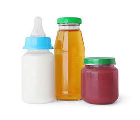Healthy baby food, bottles with milk and juice on light grey background