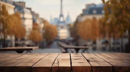 Wood table mockup with Paris city street in shallow depth of field. Copy space for product....