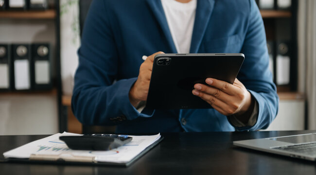 Working Process in Modern Office. Young Woman Account Manager Working at Table with New Business Project. Typing keyboard,Using Contemporary Laptop. Horizontal..