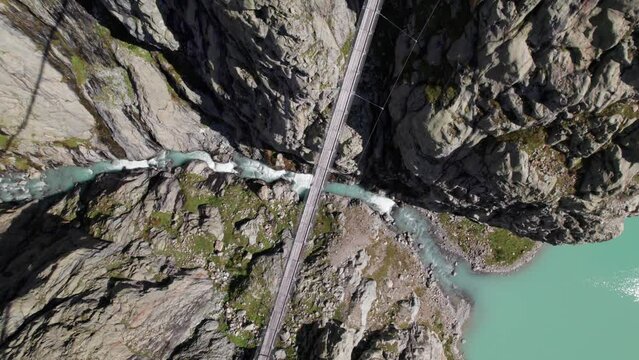 Aerial Top Down View of Triftbrucke, Trift Bridge, A Suspension Bridge in Innertkirchen, Switzerland
