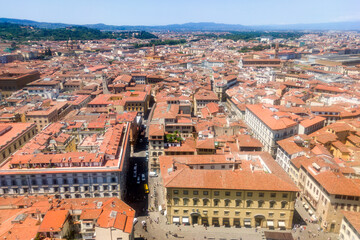 Obraz premium Florence, Italy - June 28, 2023: Panoramic rooftop view of the medieval famous city of Florence, Italy 