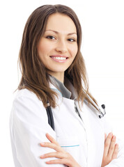 Portrait of happy smiling young female doctor, isolated over white background