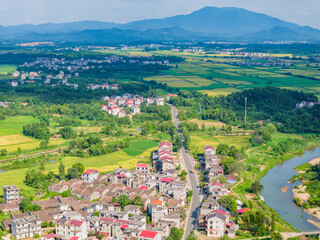 Overlook of Chinese rural houses and river scenery