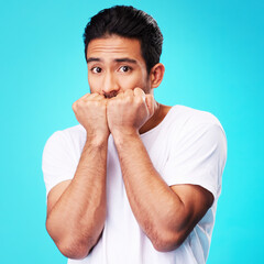 Fear, scared and portrait of man nervous, anxiety or anxious due to crisis or stress isolated in a...