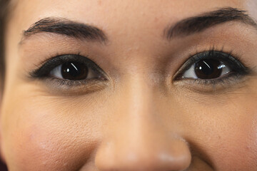 Close up of eyes of a biracial woman at office