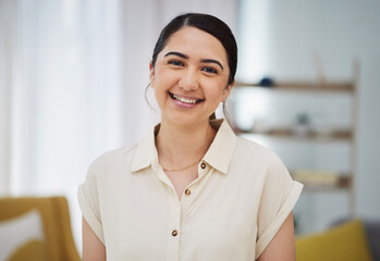 Portrait, smile and woman in home to relax in good mood, me time and self care in Colombia. Face of happy young female person in living room with confidence, freedom and enjoy break in apartment