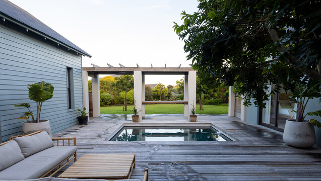 General view of terrace with swimming pool and trees