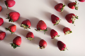 Flat lay composition with with tasty ripe strawberries on white background