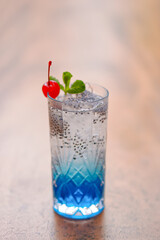 Blue Ocean Drink with Soda and Cherry Topping