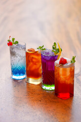 Four drink Ice Tea Blue Soda with Topping Strawberry and Cherry