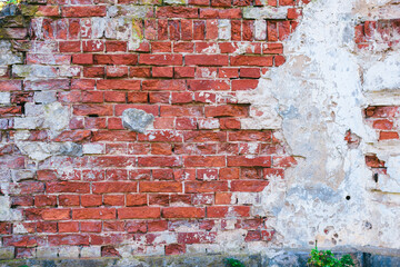 Fragment of a collapsed red brick wall