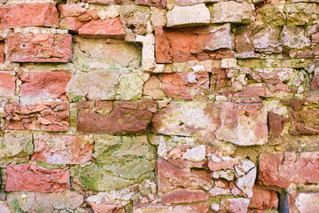 Fragment of a collapsed red brick wall