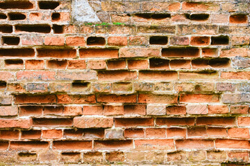 Fragment of a collapsed red brick wall