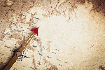 Compass on an old map. Concept of travel planning, direction, terrain, adventurer's treasure hunt. with space to copy