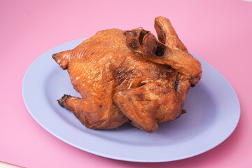 roasted whole chicken on plate
