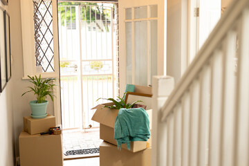 Close up of boxes on floor in hall at home