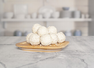 Coconut candies in the kitchen, handmade candies