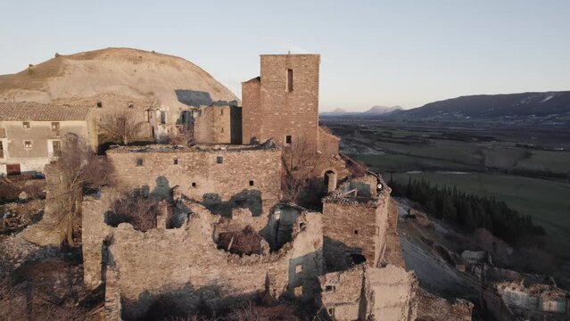Rocky formations in mountainous terrain on sunset. Embalse de Yesa, Spain