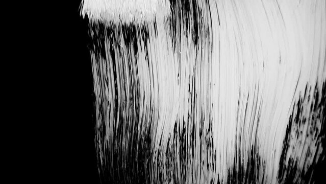 Abstract black screen hand-drawing  brush strokes on white background 