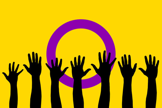 LGBTQI, trans and intersex rights concept. Human hands over Intersex pride flag on background