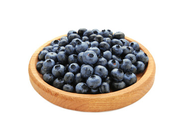 Fresh blueberry in wooden bowl isolated on white background. Top view. Concept of healthy and dieting eating