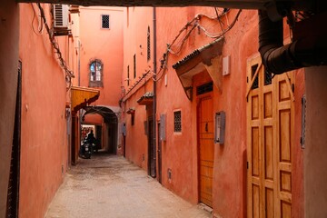 Street in medina (Old Town) of Marrakech, Morocco.