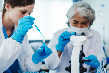 Health care researchers working in life science laboratory, Teaching in labs - Requiring students...