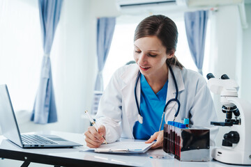 Health care researchers working in life science laboratory, Teaching in labs - Requiring students...