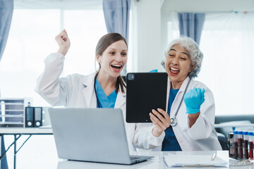 Health care researchers working in life science laboratory, Teaching in labs - Requiring students to record their laboratory methods and results as a running record of their laboratory work.