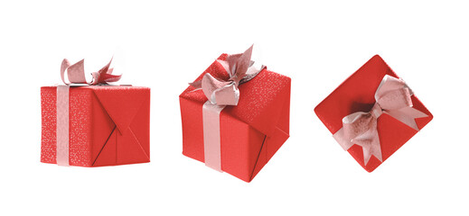 three red gifts with bow from different perspectives on isolated. 3d render