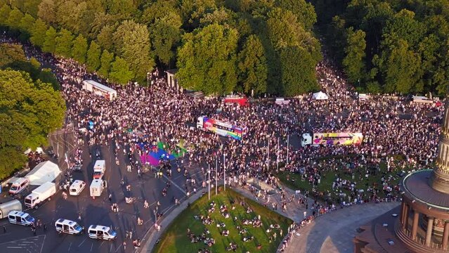 CSD Pride Parade 2023 city Berlin Gorgeous aerial top view flight Germany Summer evening Victory Column. tilt up drone
4K Cinematic footage.