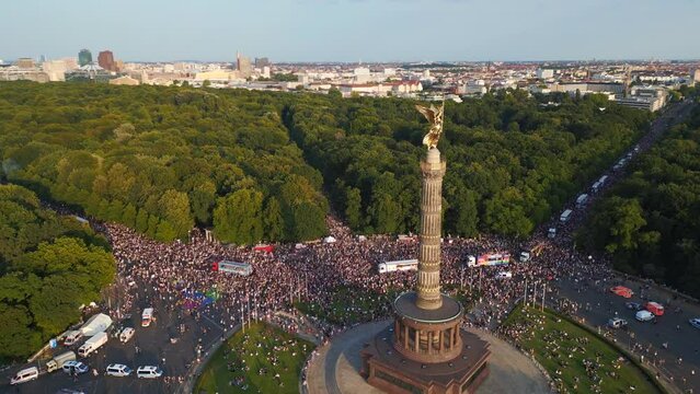 Love Parade Berlin 2023 trucks. Fantastic aerial top view flight 
CSD Pride 2023 city Germany Summer evening Victory Column. panorama overview drone
4K Cinematic footage.